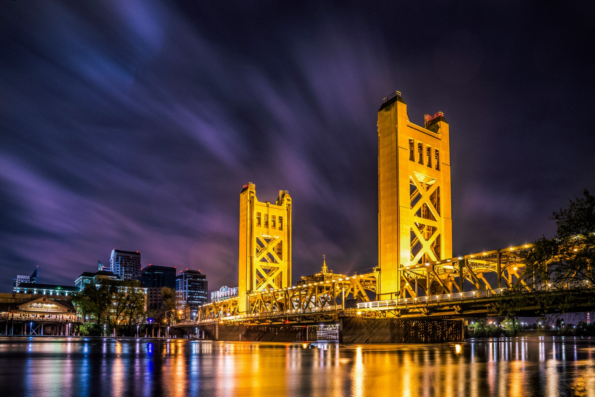 Sacramento's Tower Bridge illuminated at night